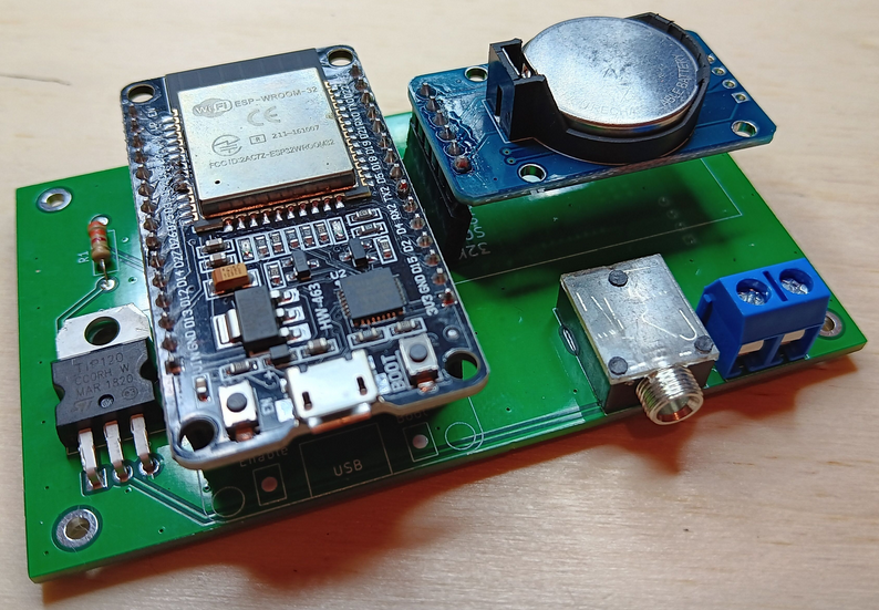 Photo of the Vulpes RO controller. It is a few electronic components soldered to a custom PCB. There is no case. Power for the controller is through the micro-USB on the ESP32 development board, timekeeping is from the RTC breakout board, and radio is keyed through either a 3.5 mm audio cable jack or screw terminal.